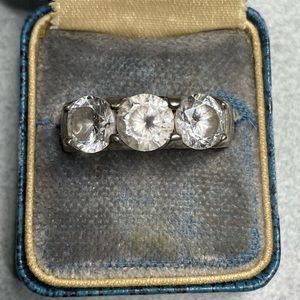2.53 Carat Tw quartz or better sterling silver triple stone size 7 ring.